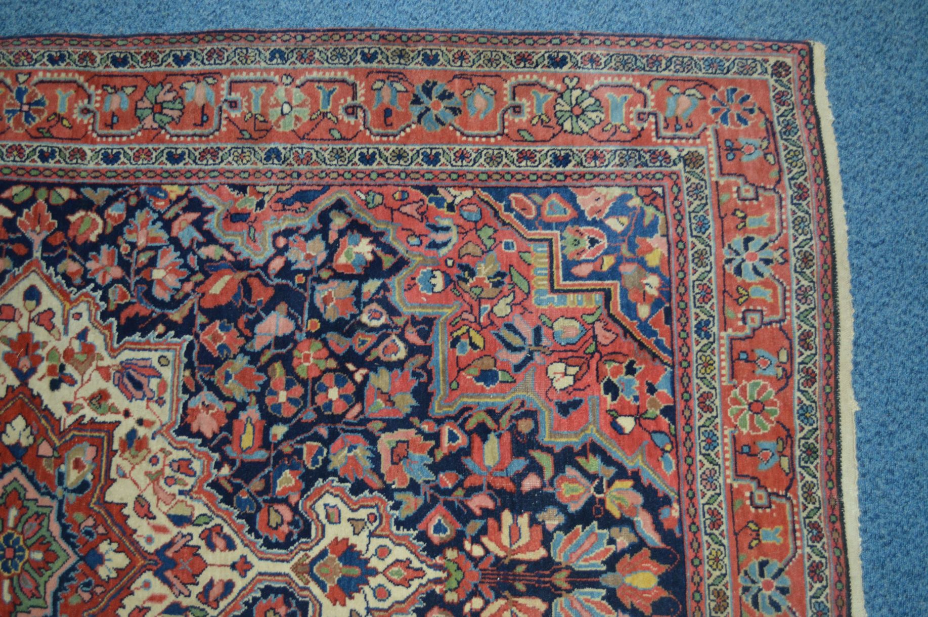 A 20TH CENTURY WOOLLEN CAUCASION RUG, red and deep blue ground, with foliate design, 205cm x - Image 2 of 4