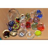 A GROUP OF GLASS PAPERWEIGHTS