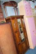 AN OAK MIRRORED SINGLE DOOR WARDROBE, and a dressing table with an oval mirror (2)