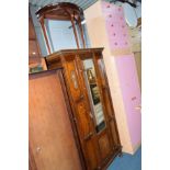 AN OAK MIRRORED SINGLE DOOR WARDROBE, and a dressing table with an oval mirror (2)