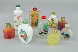 NINE SCENT BOTTLES, to include three of carved floral design, the remaining painted with Oriental