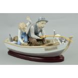 A LARGE LLADRO FIGURE GROUP, 'Fishing With Gramps' No.5215, depicting gentleman and boy in a boat