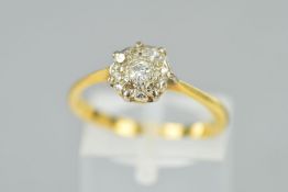 A DIAMOND CLUSTER RING, designed as a single cut diamond cluster central diamond has small chip,