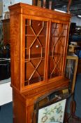 A YEW WOOD GLAZED TWO DOOR DISPLAY CABINET, above two drawers, glazed corner cupboard and a