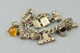 A CHARM BRACELET, designed as a curb-link bracelet suspending thirteen charms, to include a paint