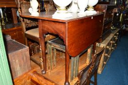 A GEORGIAN MAHOGANY GATE LEG TABLE, on padded feet, together with six early 20th Century oak
