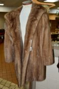 A MINK FUR COAT, 'Faulkes' label with fox fur stoles