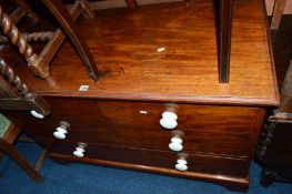 A GILLOWS LATE 19TH CENTURY MAHOGANY CHEST, of two short and two long drawers with white ceramic