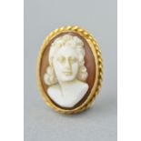 A CAMEO PENDANT, of oval outline, the cameo carved to depict a lady in profile to the rope twist