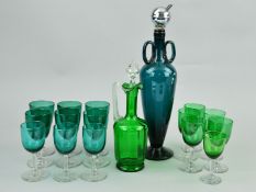 TWO GREEN DECANTERS AND VARIOUS GREEN GLASS WINE GLASSES