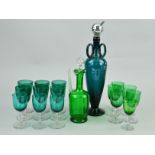 TWO GREEN DECANTERS AND VARIOUS GREEN GLASS WINE GLASSES