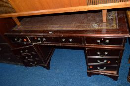 A MODERN MAHOGANY PEDESTAL DESK, with brown tooled leather inlay top, three drawers and two cupboard