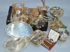 TWO BOXES OF SILVER PLATE INCLUDING TWO PAIRS OF CANDLESTICKS, cake baskets, entree dishes, cocktail