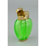 A LATE VICTORIAN S. MORDAN DOUBLE SCENT BOTTLE, the green glass body with silver gilt lid engraved