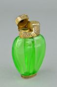 A LATE VICTORIAN S. MORDAN DOUBLE SCENT BOTTLE, the green glass body with silver gilt lid engraved