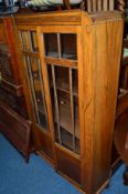 A MID 20TH CENTURY OAK ASTRAGAL GLAZED TWO DOOR BOOKCASE, approximate size width 91cm x depth 82cm x