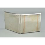 A GEORGE V SILVER AND GOLD INLAID RECTANGULAR CIGARETTE CASE, engine turned decoration, gilt