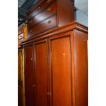 A STAG MAHOGANY THREE DOOR WARDROBE, width 147cm x depth 60cm x height 202cm, together with a