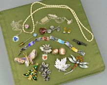 A SELECTION OF JEWELLERY, to include an enamel Siam panel bracelet, a guilloche enamel blue, white