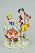 A SITZENDORF FIGURE GROUP, courting couple in 18th Century dress, encrusted with flowers, height
