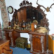 A LARGE EARLY 20TH CENTURY BLACK FOREST STYLE OAK MIRROR BACK SIDEBOARD, the mirrored back of an