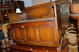 A 20TH CENTURY OAK HALL BENCH, with a hinged compartment, approximate width 91cm