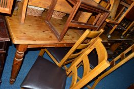 A SET OF FIVE LIGHT OAK CHAIRS, including one carver, together with a pine refectory table,