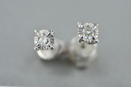 A MODERN PAIR OF DIAMOND SINGLE STONE EARRINGS, post and scroll fittings, modern round brilliant cut