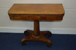A REGENCY ROSEWOOD FOLD OVER CARD TABLE, distressed baize interior, canted front corners on a