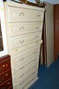 TWO CREAM TWO DOOR WARDROBES (one dismantled), two matching chest of drawers and another chest of