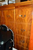 A YEW WOOD THREE DOOR CABINET, above three deep drawers, approximate size width 139cm x depth 51cm x
