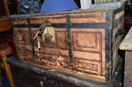 A VICTORIAN PINE METAL BOUNDED TRUNK, a Victorian pine blanket chest, a painted ammo crate, two