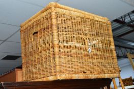 A LARGE WICKER BASKET, approximate size width 68cm x depth 55cm x height 55cm