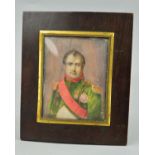 A SMALL ANTIQUE GLAZED WOODEN FRAME WITH A WHAT APPEARS TO BE A HAND PAINTED BUST PAINTING OF THE