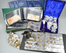 A BOX CONTAINING COINS, BANKNOTES AND MISCELLANEOUS ITEMS, to include two albums with interesting
