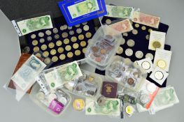 A BOX CONTAINING MAINLY BRITISH COINAGE AND BANKNOTES, to include sixteen various designs of five