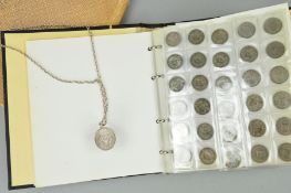 A COIN ALBUM, with mainly UK coins, to include a William IV shilling coin 1834, along with a mounted