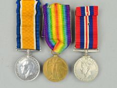 A WWI PAIR OF MEDALS, BWM & Victory, named to 97065 Pte J. Johnson, Tank Corps, together with a WWII
