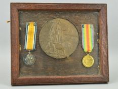 A FRAMED WWI BRITISH WAR & VICTORY MEDALS, together with a Memorial Death plaque, named George