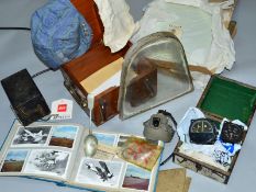 A LARGE BOX CONTAINING A NUMBER OF MILITARY RELATED ITEMS FROM THE WWII PERIOD, an afterwards