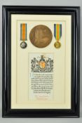 A GLAZED AND SEALED FRAME CONTAINING THE WWI BRITISH WAR & VICTORY MEDALS AND MEMORIAL DEATH PLAQUE,