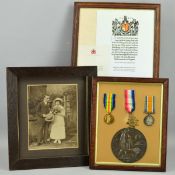 A FRAMED WWI 1914-15 STAR TRIO OF MEDALS, together with Memorial Death plaque commemorating the