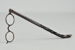 A PAIR OF LATE 19TH CENTURY TORTOISESHELL LORGNETTES, the long arm with a carved twist design