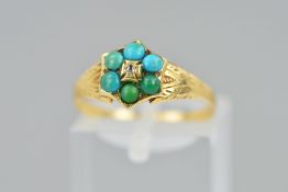 A LATE VICTORIAN GOLD TURQUOISE AND DIAMOND RING, the central old cut diamond within a circular