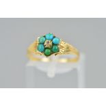 A LATE VICTORIAN GOLD TURQUOISE AND DIAMOND RING, the central old cut diamond within a circular