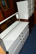 A MODERN DRESSING CHEST, a pair of bedsides and a two door cabinet (4)