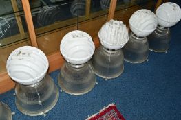 A SET OF FIVE INDUSTRIAL CEILING LIGHTS with glazed shades, approximate diameter