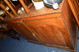 A VICTORIAN OAK PANELLED TWO DOOR CABINET, approximate size width 147cm x depth 59cm x height 111cm
