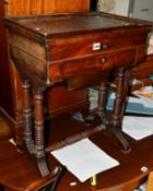 A VICTORIAN FLAME MAHOGANY SEWING TABLE, with hinged lid and single drawer on bobbin uprights and