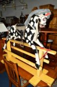 A VICTORIAN PAINTED ROCKING HORSE, approximate size width 128cm x height 100cm